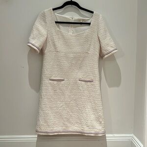 Mildly worn, fits a size M, above the knee